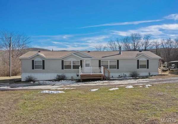 10.7 Acres of Land with Home for Sale in Elsberry, Missouri