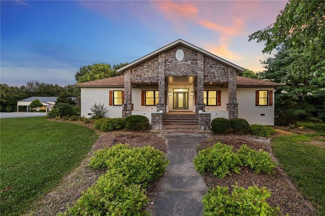 2.5 Acres of Land with Home for Sale in Gravette, Arkansas