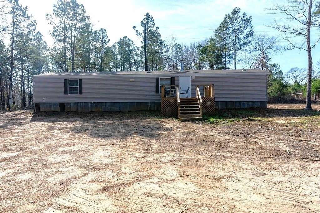 12.6 Acres of Land with Home for Sale in Palestine, Texas