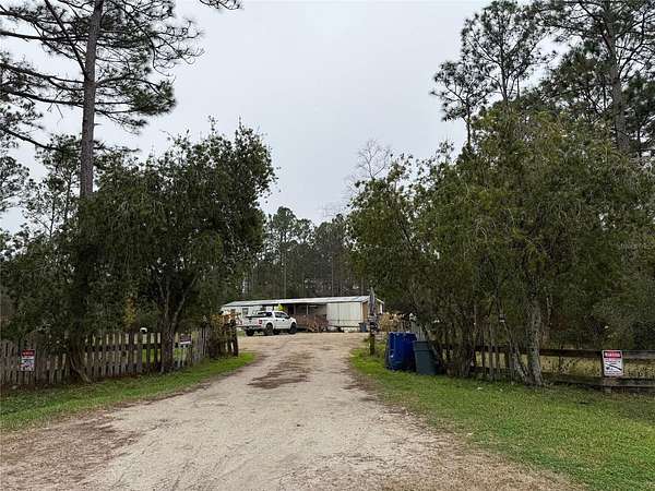 2.1 Acres of Residential Land with Home for Sale in Bunnell, Florida
