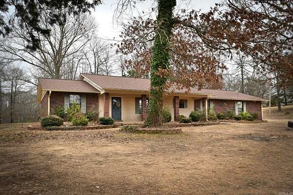 30.2 Acres of Recreational Land with Home for Sale in Wickes, Arkansas