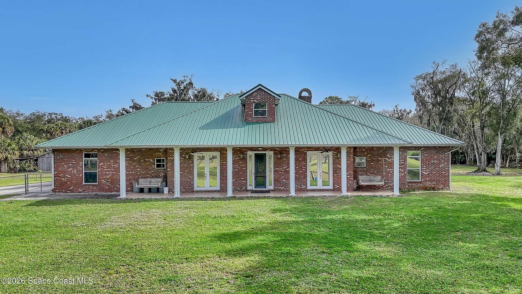 6.2 Acres of Residential Land with Home for Sale in Merritt Island, Florida