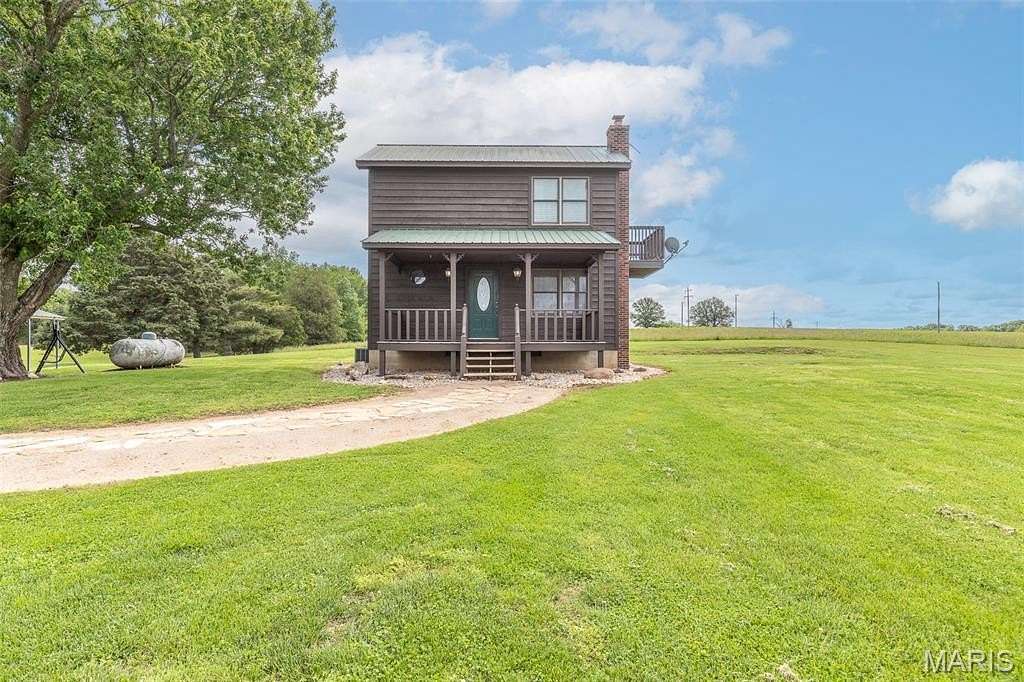 71.3 Acres of Land with Home for Sale in Bloomfield, Missouri