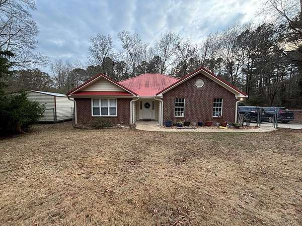2.66 Acres of Residential Land with Home for Sale in Fortson, Georgia