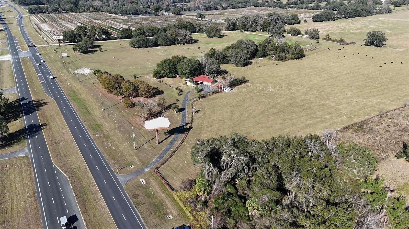 6.79 Acres of Land with Home for Sale in Belleview, Florida