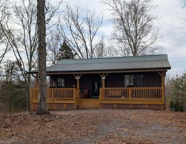 5.24 Acres of Land with Home for Sale in Bybee, Tennessee