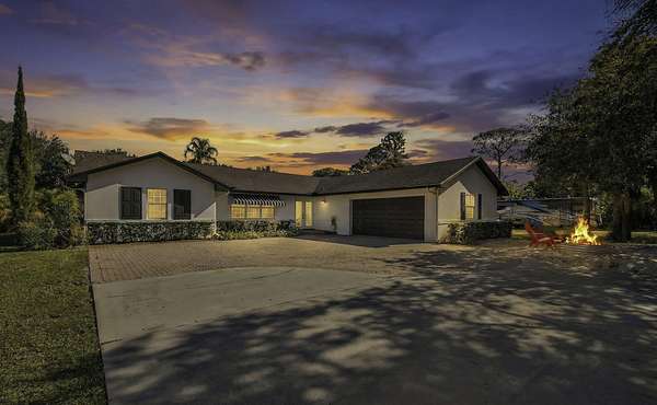 1.5 Acres of Residential Land with Home for Sale in Palm Beach Gardens, Florida