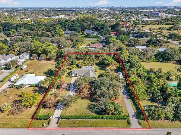 1.5 Acres of Land with Home for Sale in Palm Beach Gardens, Florida