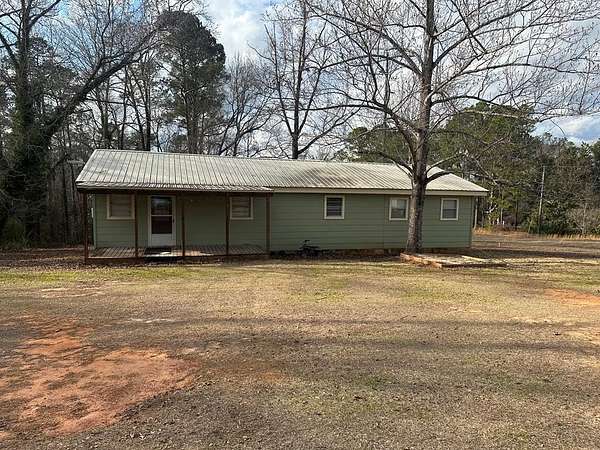 1.63 Acres of Residential Land with Home for Sale in McIntyre, Georgia