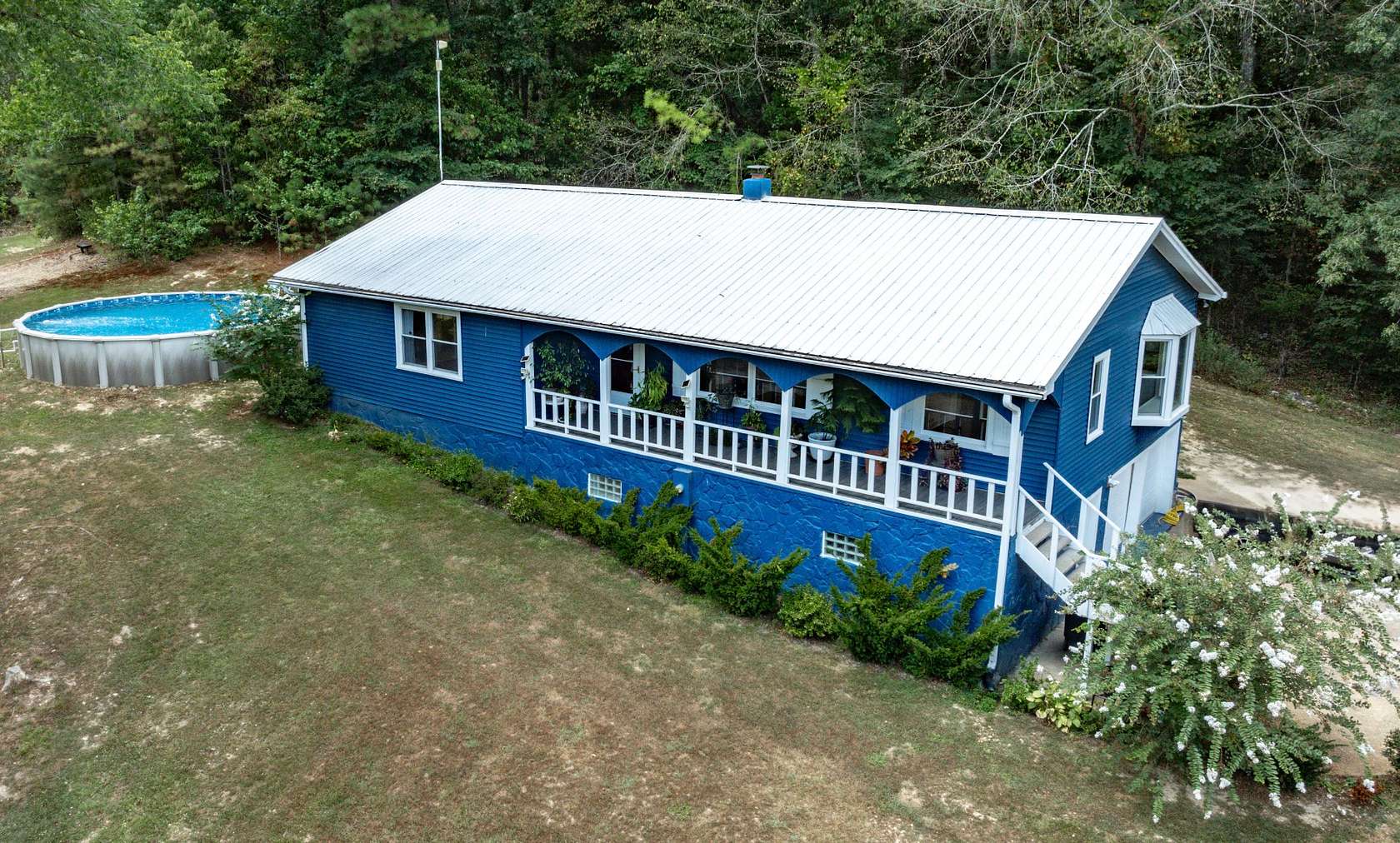 4.74 Acres of Residential Land with Home for Sale in Eva, Tennessee