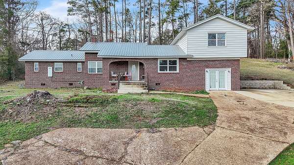 2.1 Acres of Residential Land with Home for Sale in Columbus, Mississippi