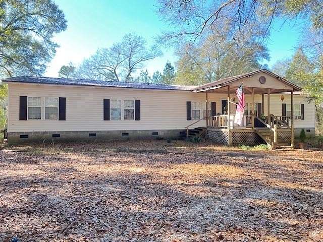 4.5 Acres of Residential Land with Home for Sale in Buckatunna, Mississippi