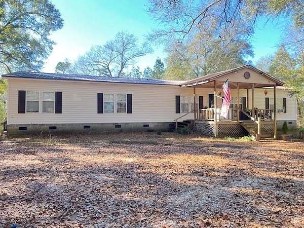 4.5 Acres of Residential Land with Home for Sale in Buckatunna, Mississippi