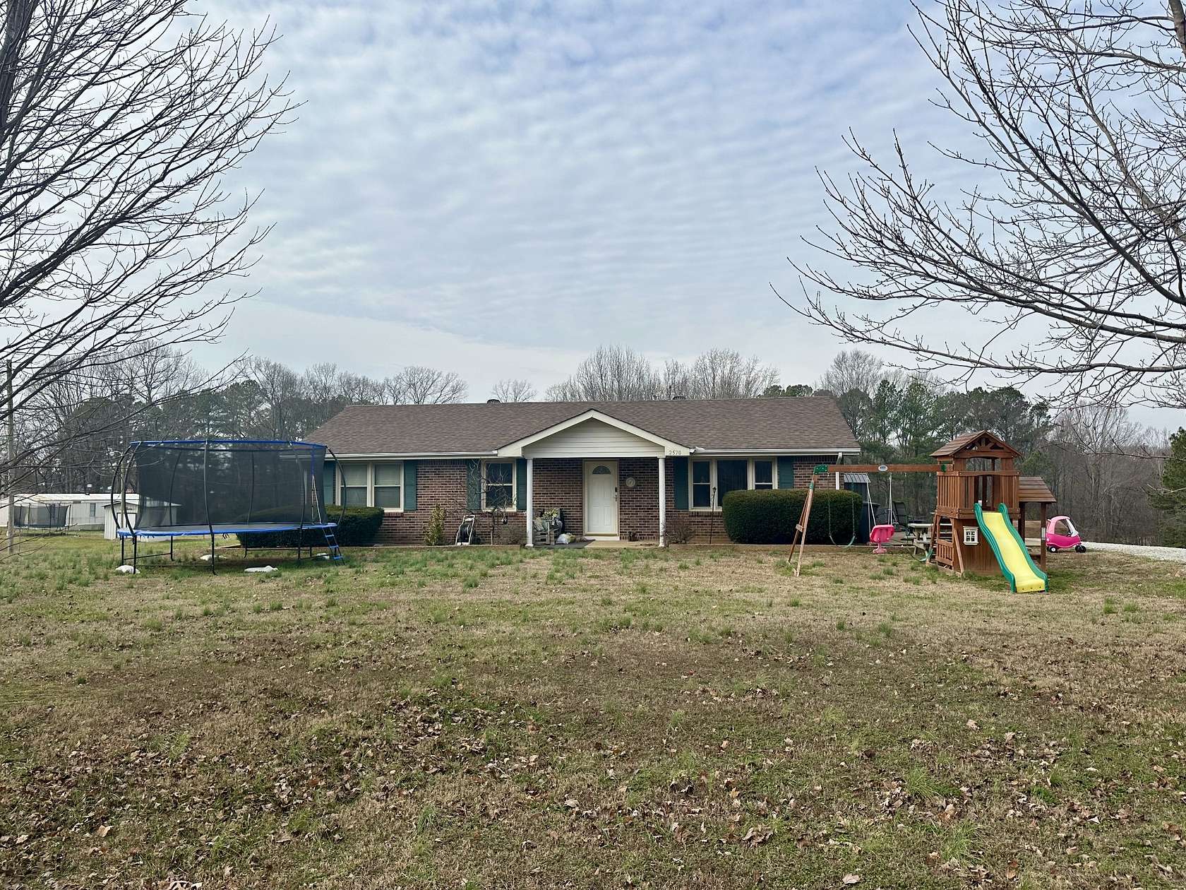 1.5 Acres of Residential Land with Home for Sale in Tennessee Ridge, Tennessee