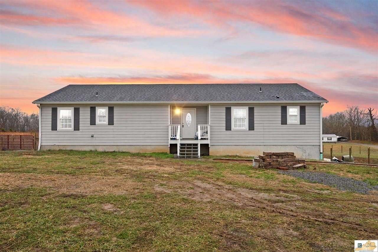 7.42 Acres of Land with Home for Sale in Scottsville, Kentucky