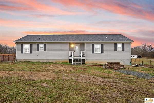 7.42 Acres of Land with Home for Sale in Scottsville, Kentucky