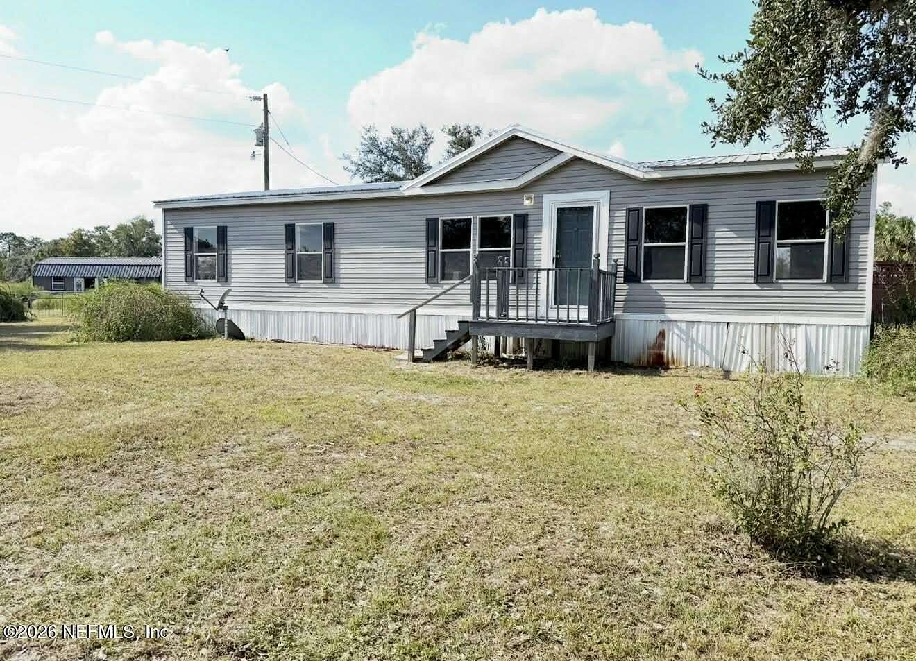 11.4 Acres of Land with Home for Sale in Perry, Florida