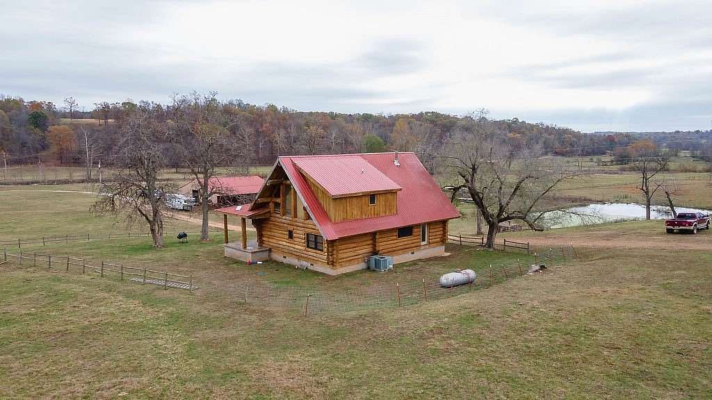 122 Acres of Land with Home for Sale in Gentry, Arkansas
