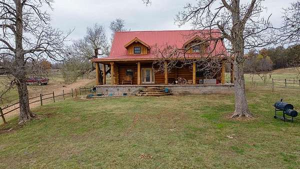 122 Acres of Land with Home for Sale in Gentry, Arkansas