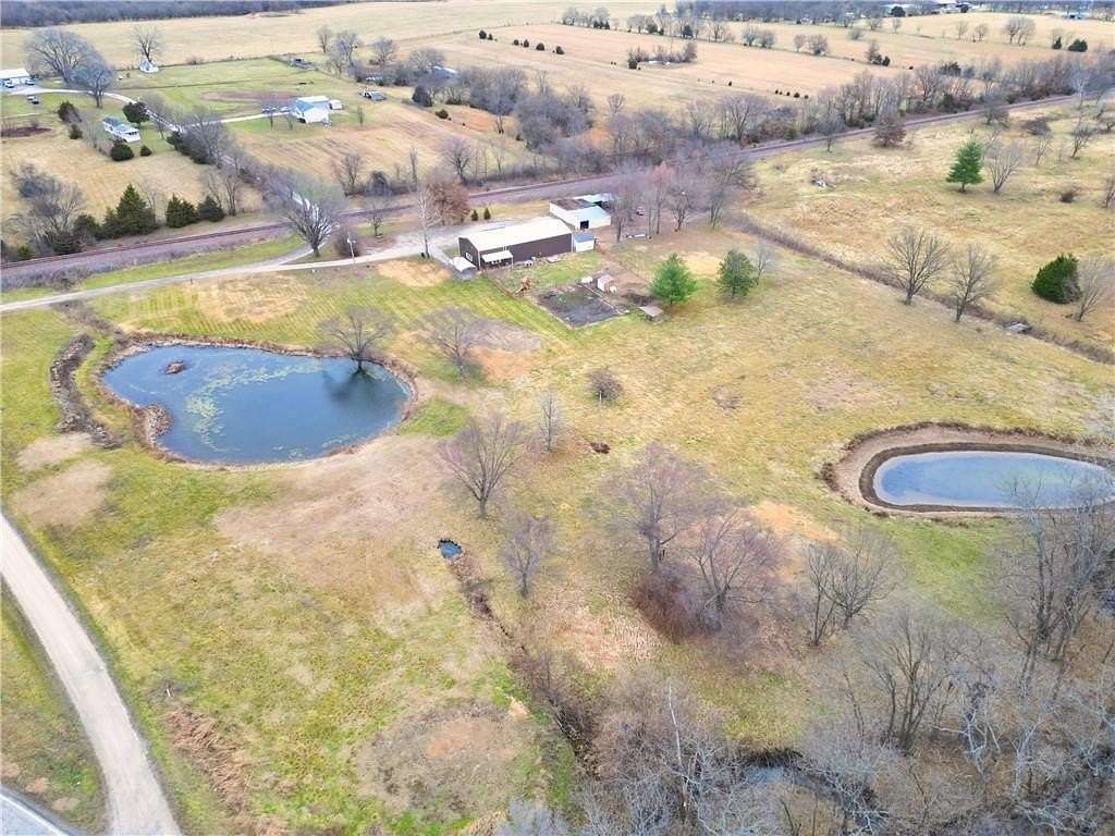 25 Acres of Land with Home for Sale in Kingsville, Missouri