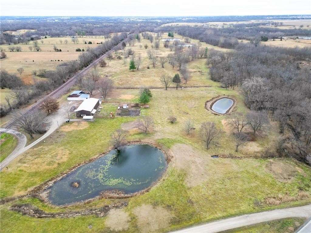 25 Acres of Agricultural Land with Home for Sale in Kingsville, Missouri