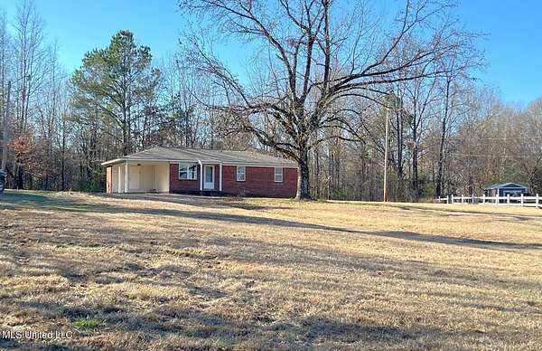 2.3 Acres of Residential Land with Home for Sale in Coldwater, Mississippi