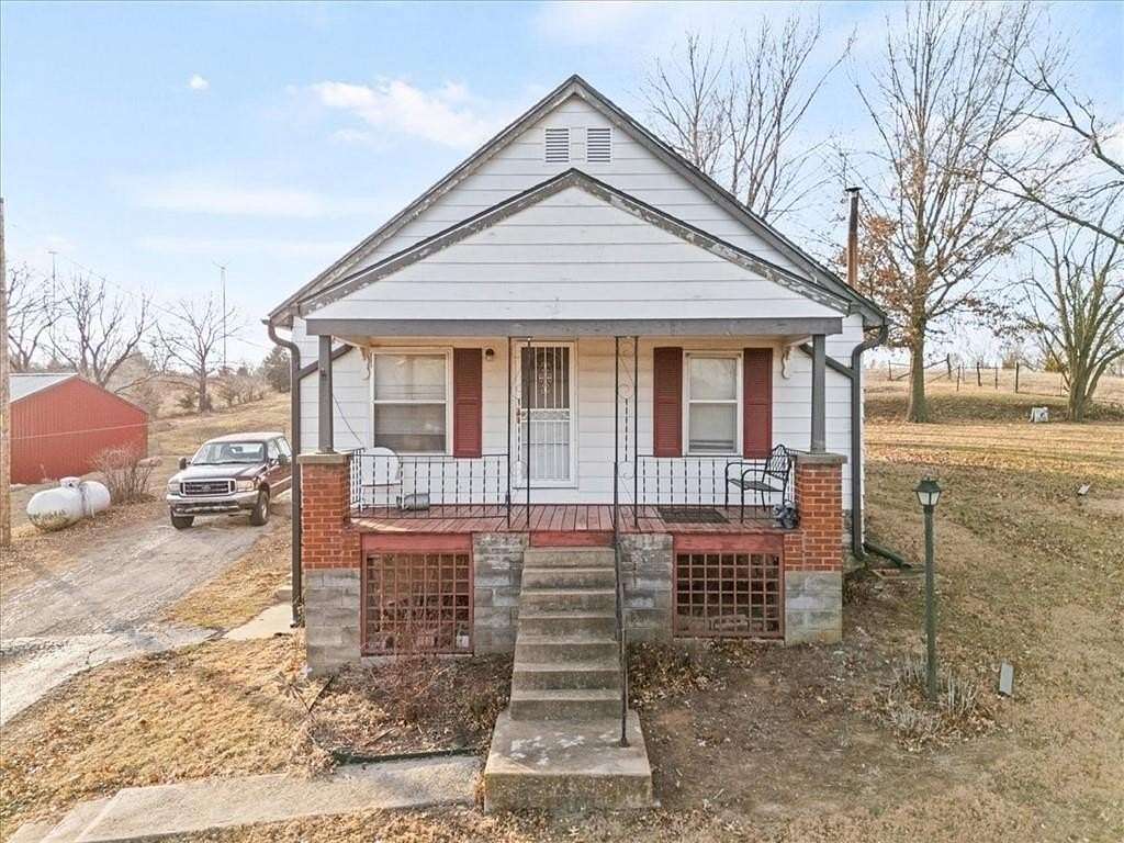 19.9 Acres of Recreational Land with Home for Sale in Edwardsville, Kansas