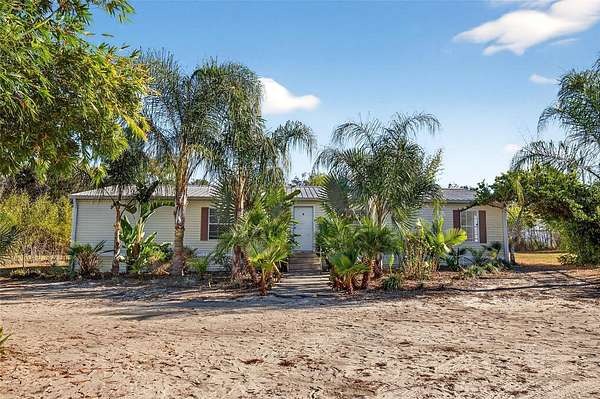 3 Acres of Residential Land with Home for Sale in East Lake Weir, Florida