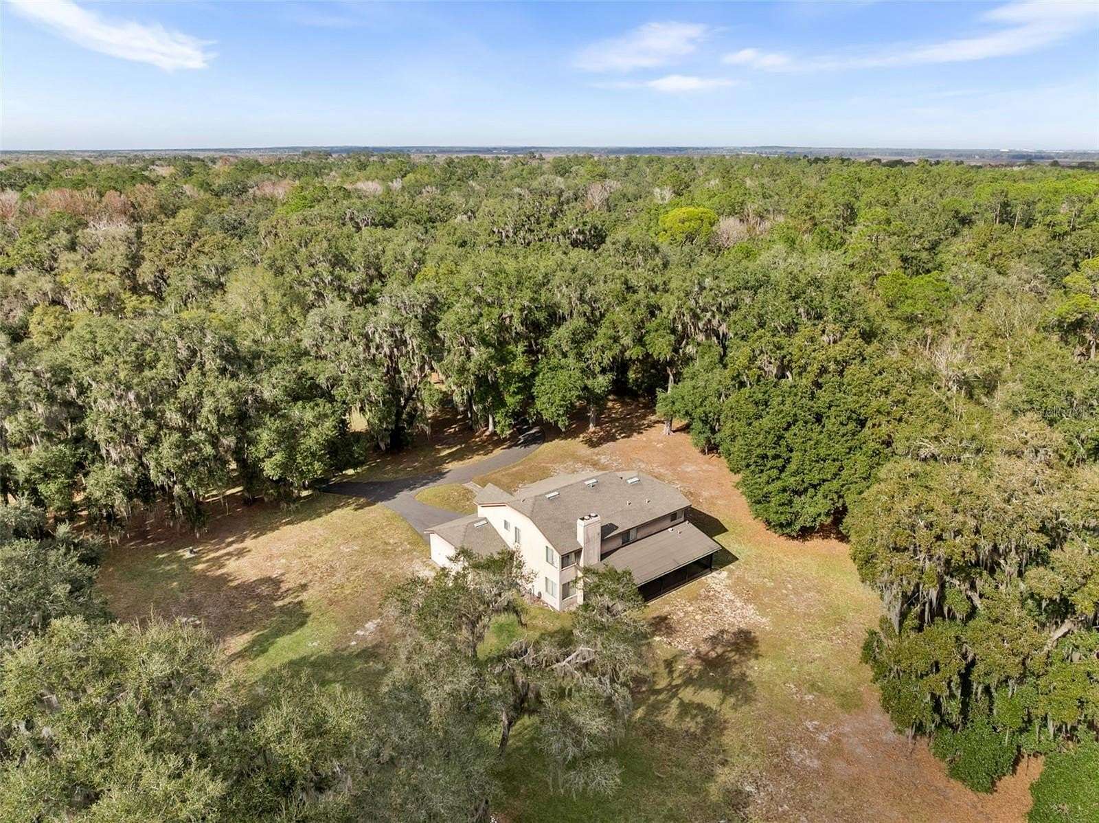 5.24 Acres of Residential Land with Home for Sale in Micanopy, Florida