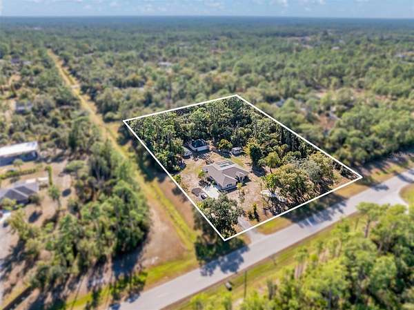 3 Acres of Residential Land with Home for Sale in North Port, Florida