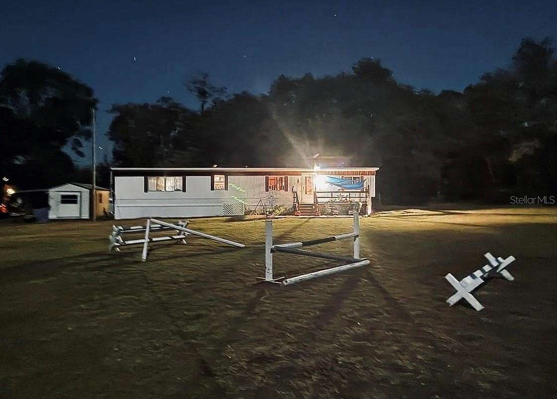 2.5 Acres of Land with Home for Sale in Morriston, Florida