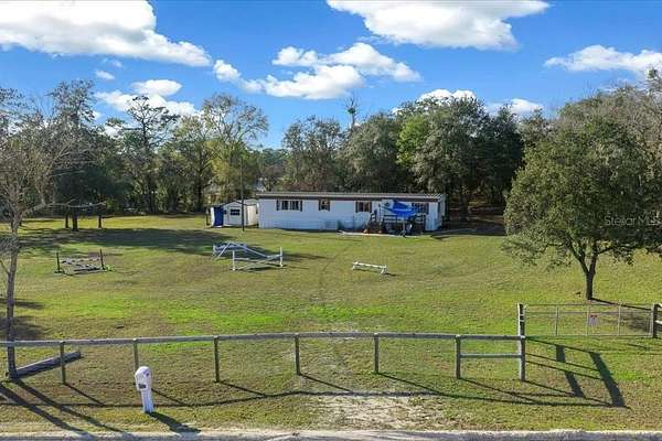 2.5 Acres of Residential Land with Home for Sale in Morriston, Florida