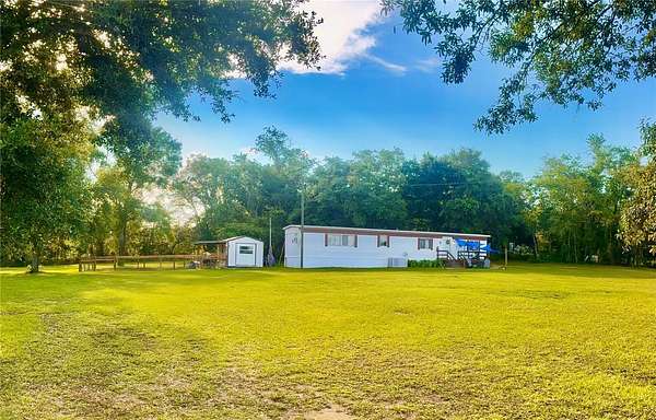 2.5 Acres of Land with Home for Sale in Morriston, Florida