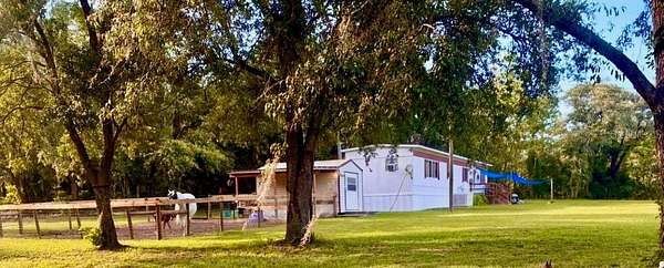 2.5 Acres of Land with Home for Sale in Morriston, Florida