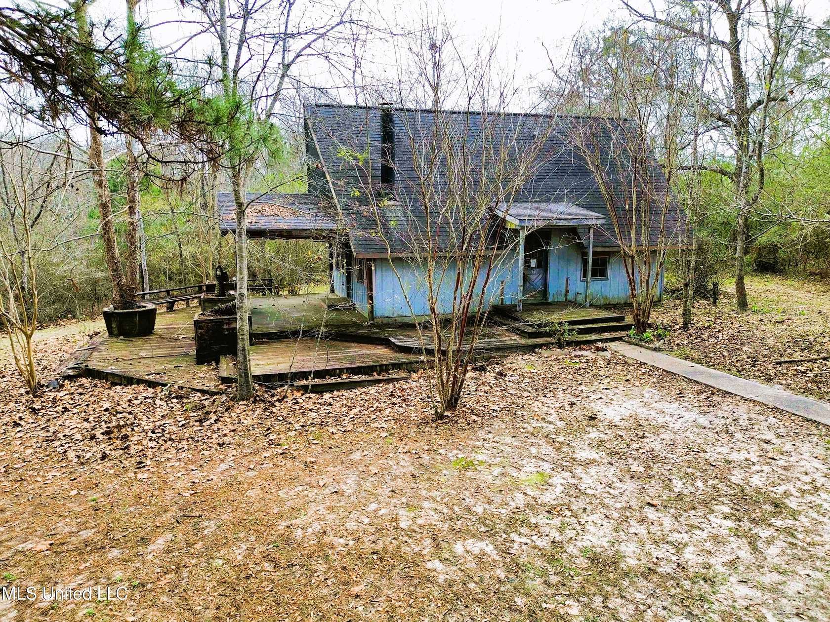 7.8 Acres of Residential Land with Home for Sale in Saucier, Mississippi