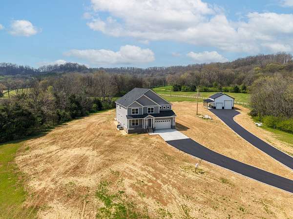 13.6 Acres of Land with Home for Sale in Mount Pleasant, Tennessee