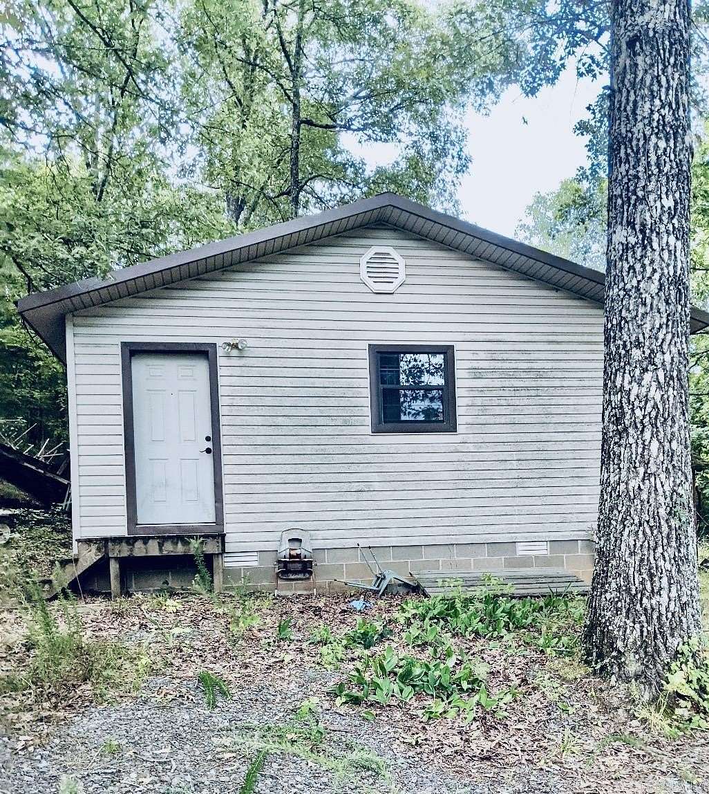 0.54 Acres of Residential Land with Home for Sale in Clinton, Arkansas