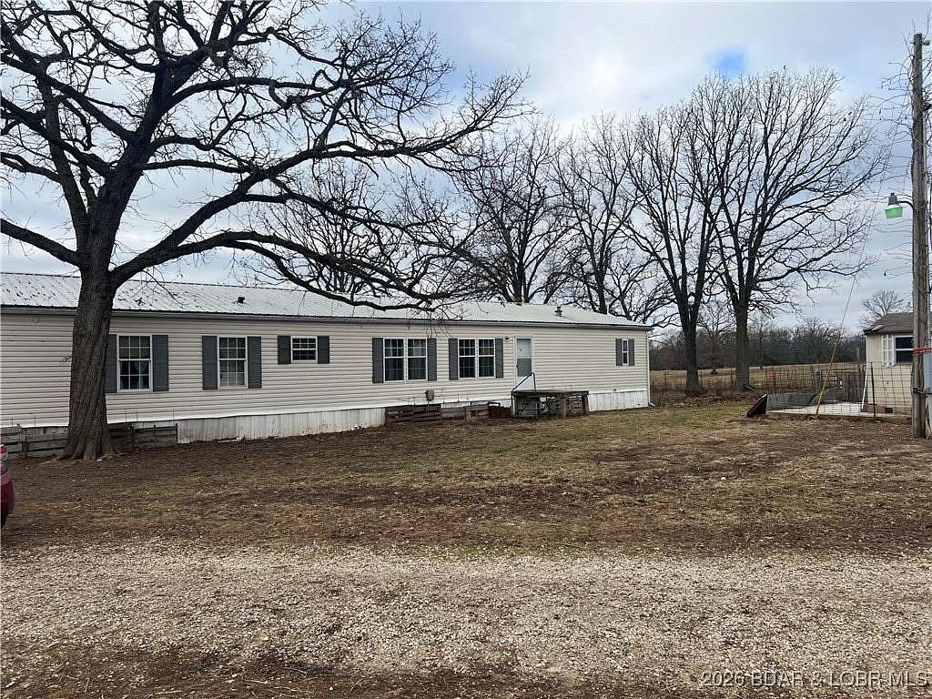 60 Acres of Land with Home for Sale in Stover, Missouri