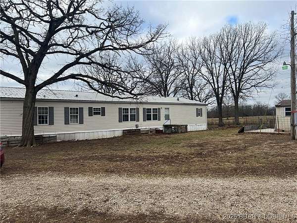60 Acres of Land with Home for Sale in Stover, Missouri