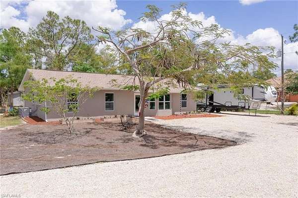 2.5 Acres of Residential Land with Home for Sale in Naples, Florida