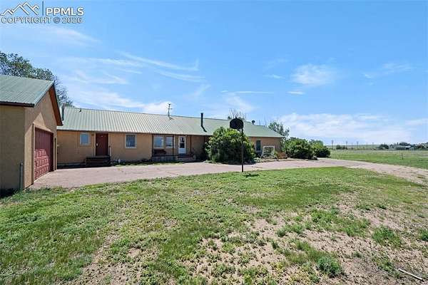 40 Acres of Agricultural Land with Home for Sale in Peyton, Colorado