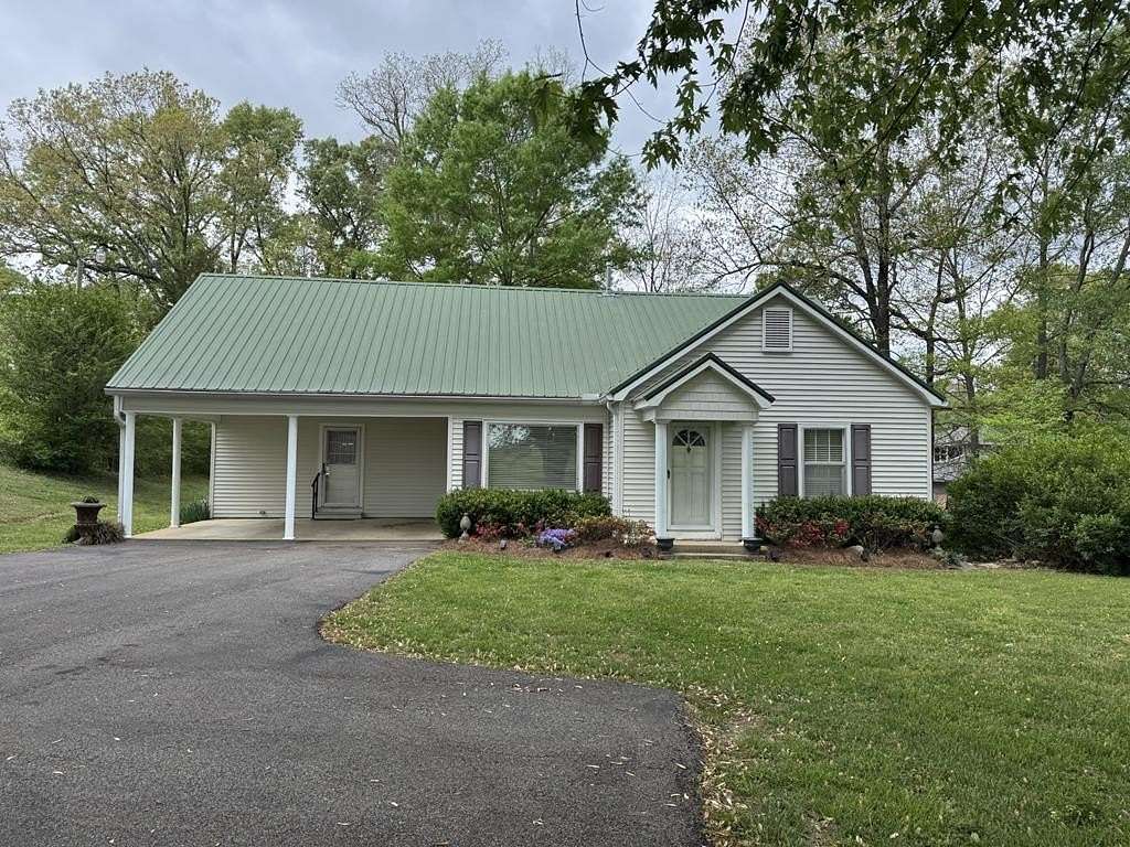 1.5 Acres of Land with Home for Sale in McKenzie, Tennessee