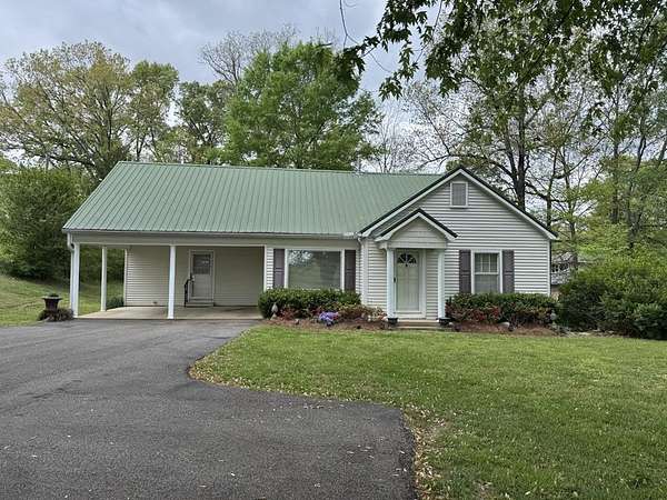 1.5 Acres of Land with Home for Sale in McKenzie, Tennessee