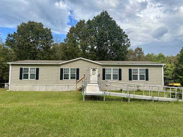 14 Acres of Land with Home for Sale in Tupelo, Mississippi