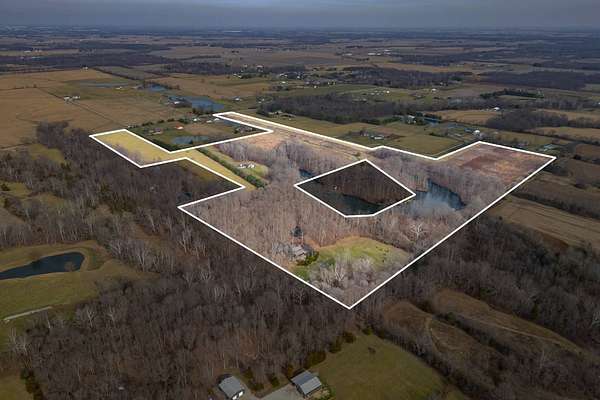 60 Acres of Land with Home for Sale in Trafalgar, Indiana