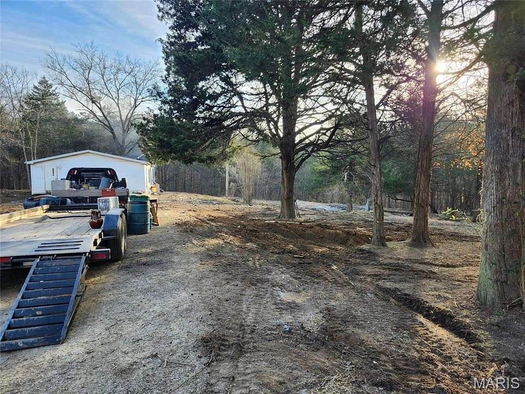 5.6 Acres of Residential Land with Home for Sale in De Soto, Missouri