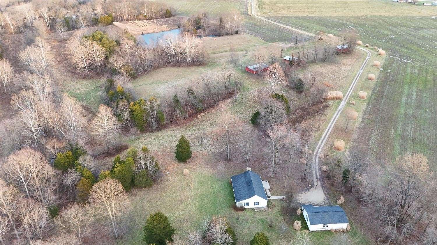 6.9 Acres of Land with Home for Sale in Sunman, Indiana