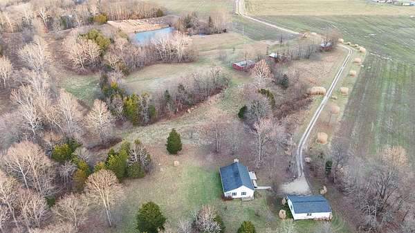 6.9 Acres of Land with Home for Sale in Sunman, Indiana