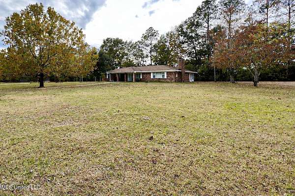 2.2 Acres of Residential Land with Home for Sale in Pass Christian, Mississippi
