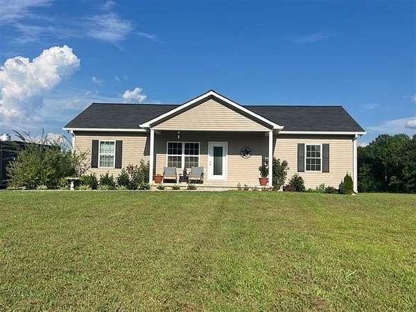 1.5 Acres of Residential Land with Home for Sale in Scottsville, Kentucky